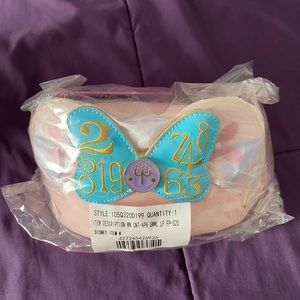 Main attraction it’s a small world loungefly bag